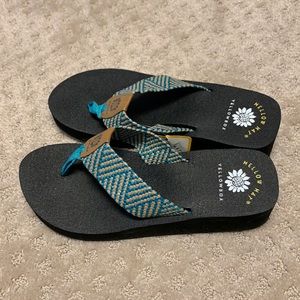 Yellow box flip flops